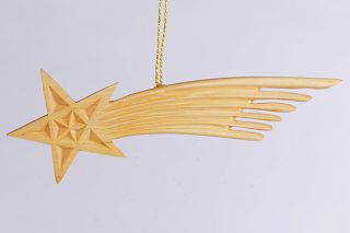 Komet aus Linde geschnitzt